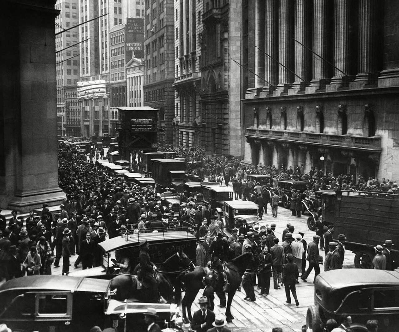 Black and white photo of Wall Street during the Wall Street Crash of 1929.
