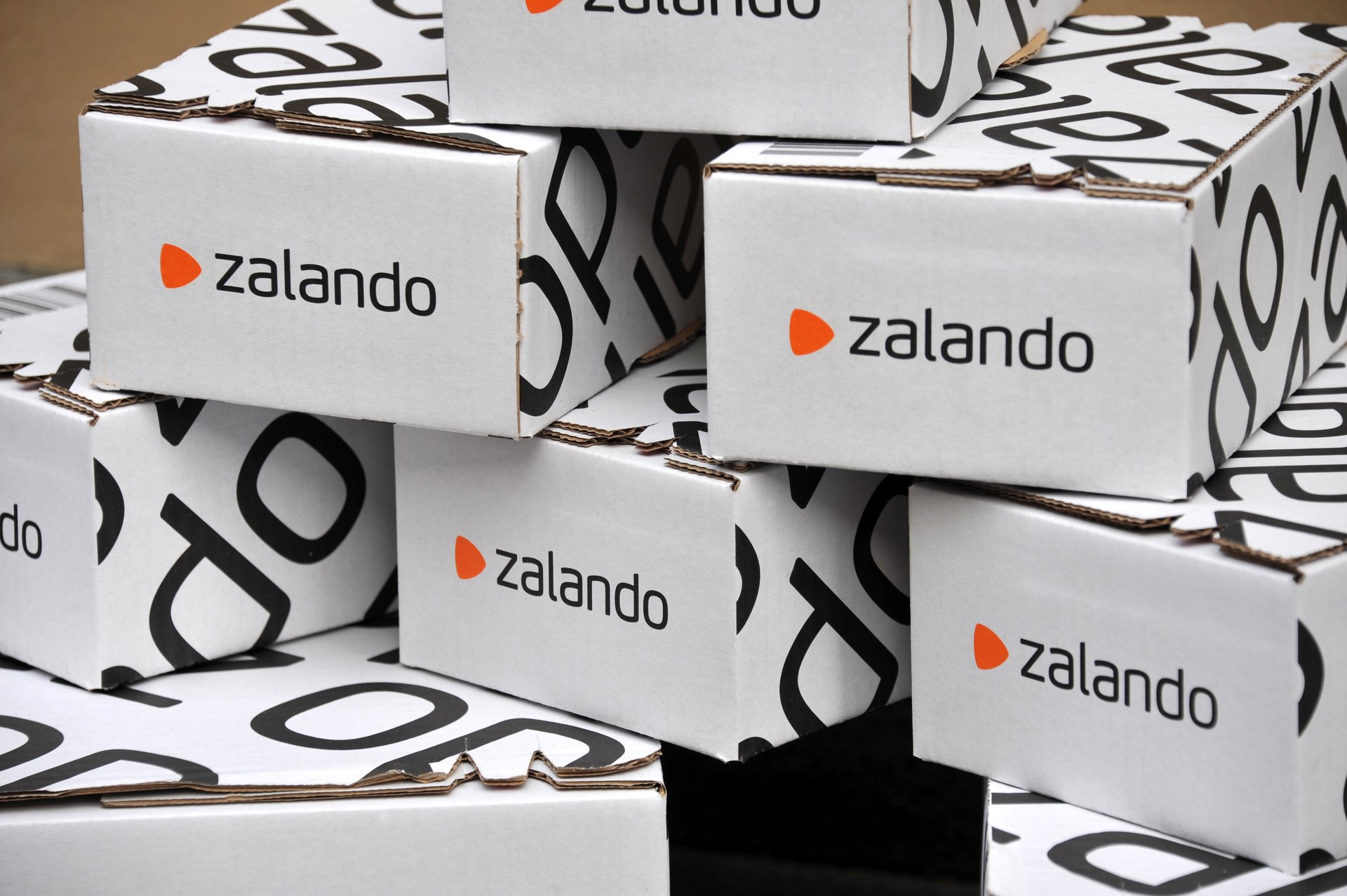 Stack of Zalando branded cardboard boxes.