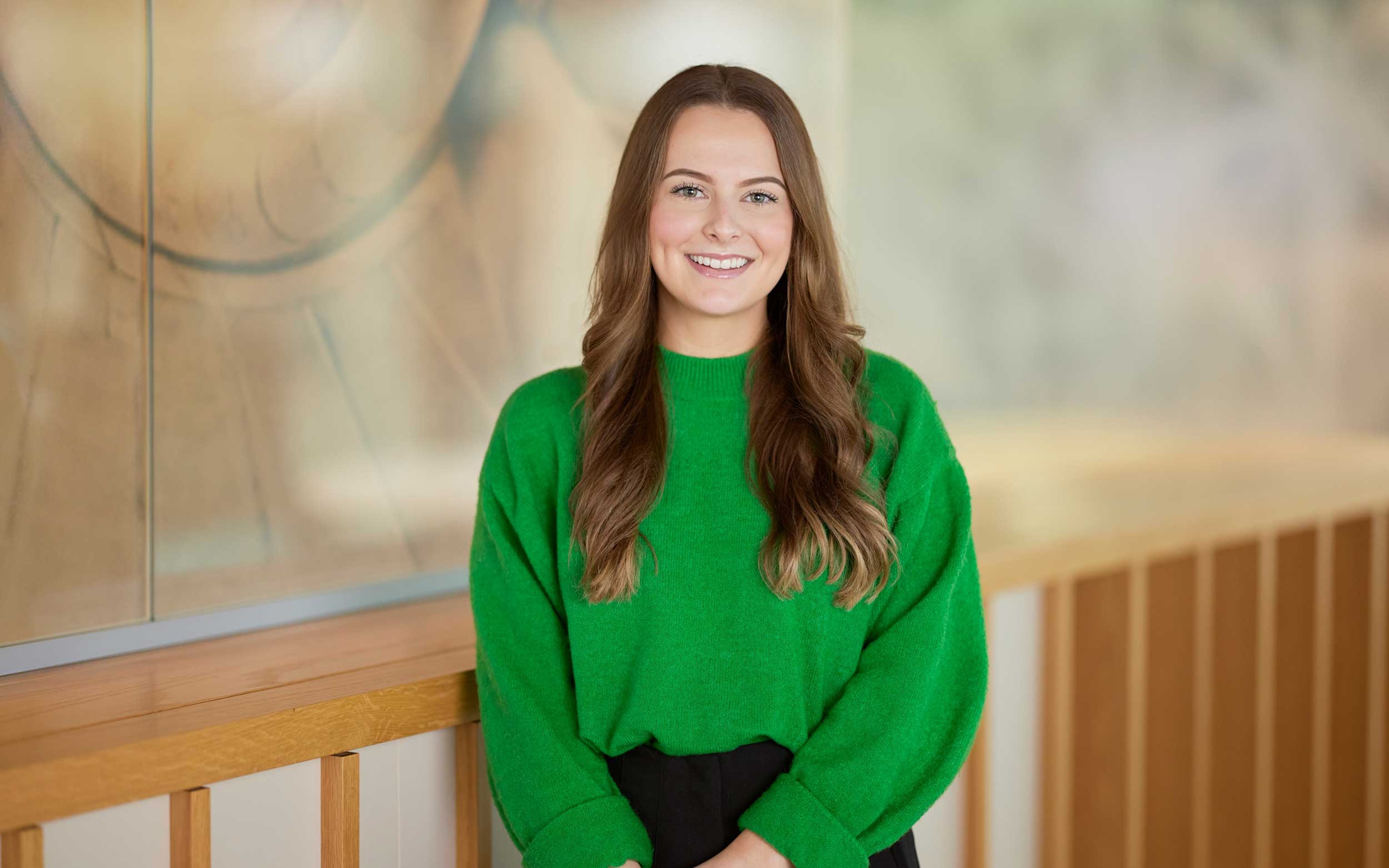 Amy Smith stood in the Baillie Gifford office.