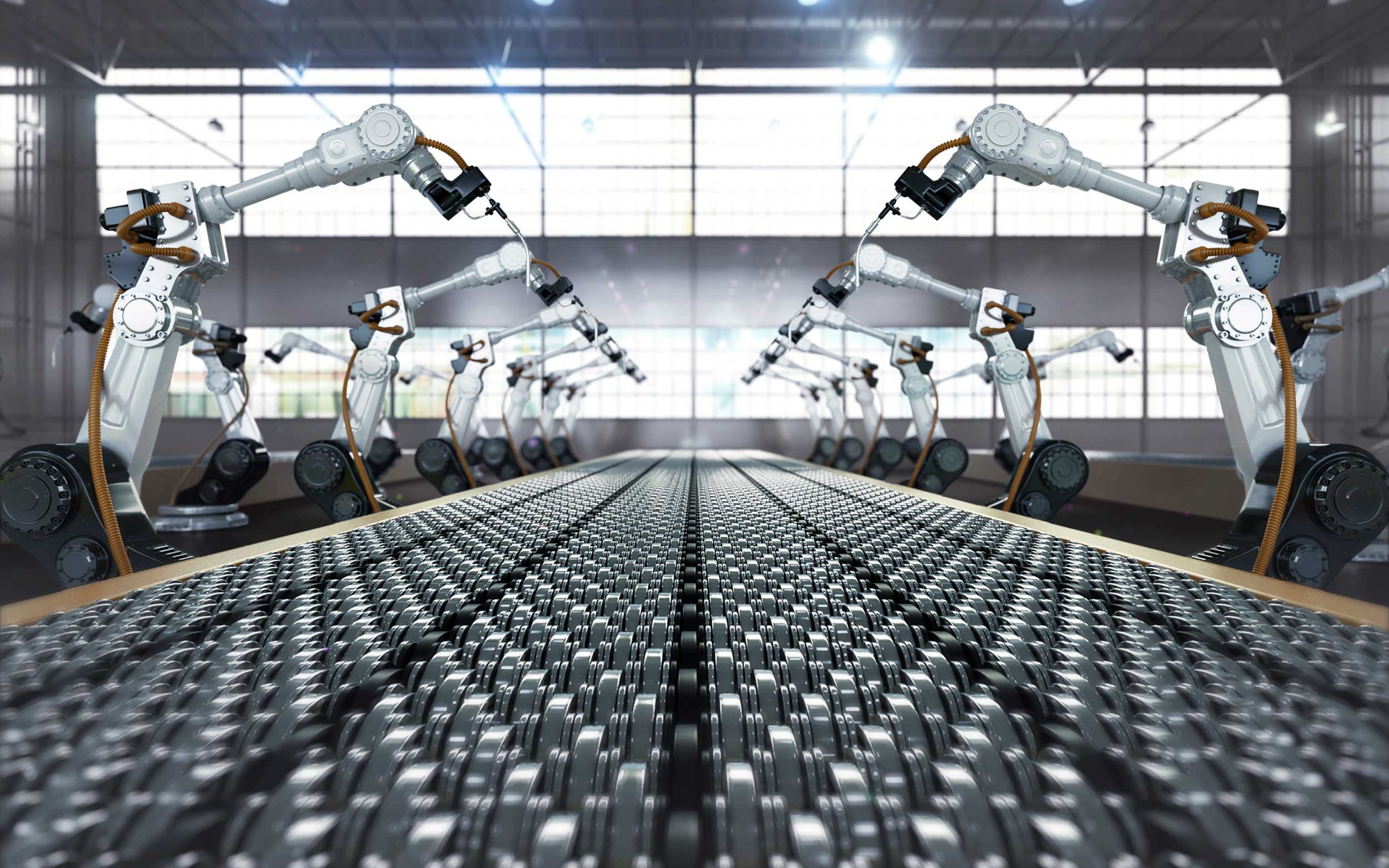 Robotic arm welding in a futuristic assembly automotive manufacturing plant.