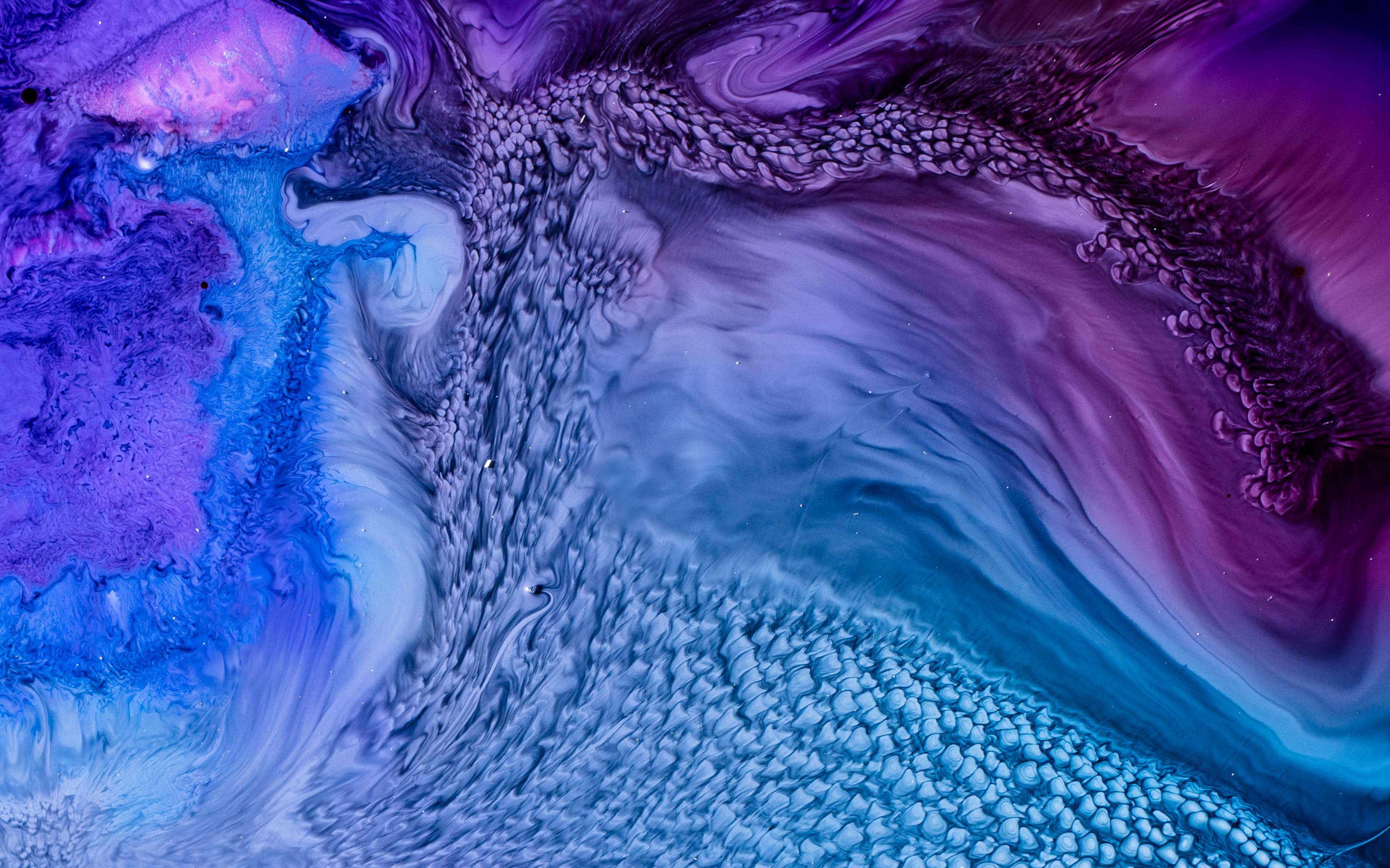 Close up shot of abstract patterns made out of liquid ink.