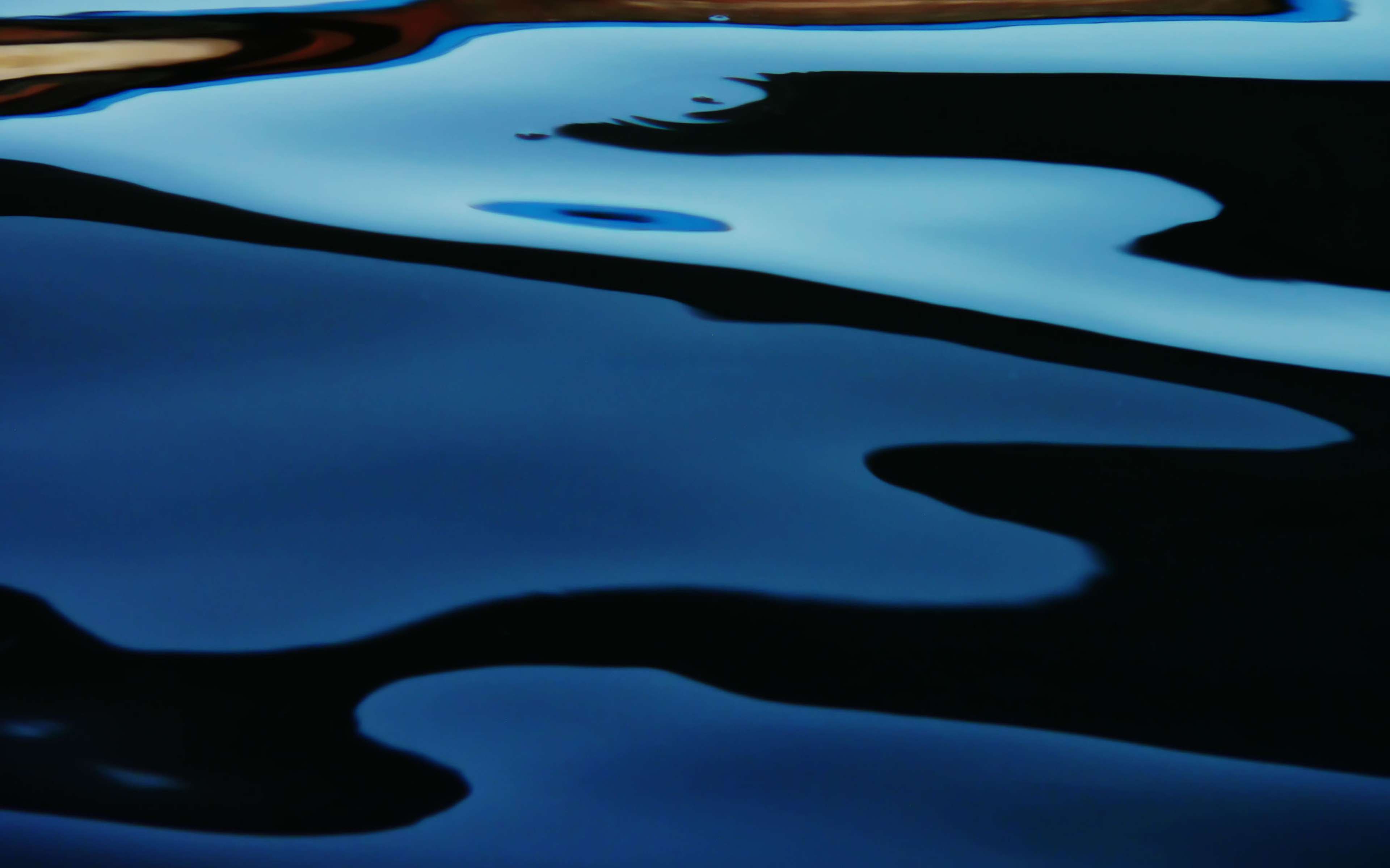 Colorful abstract of close up water with smooth waves.