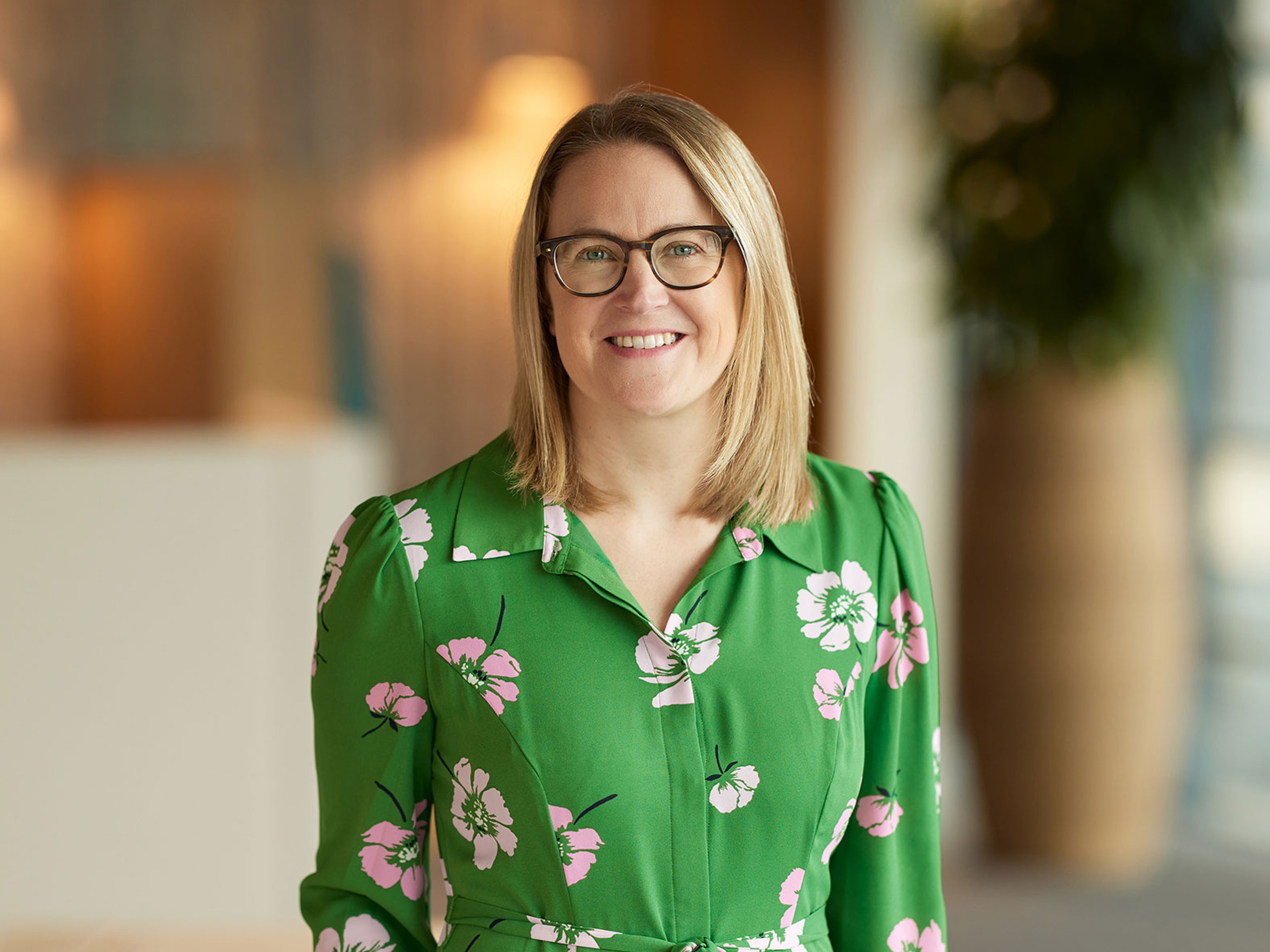 Lyndsay Cooper stood in the Baillie Gifford office.