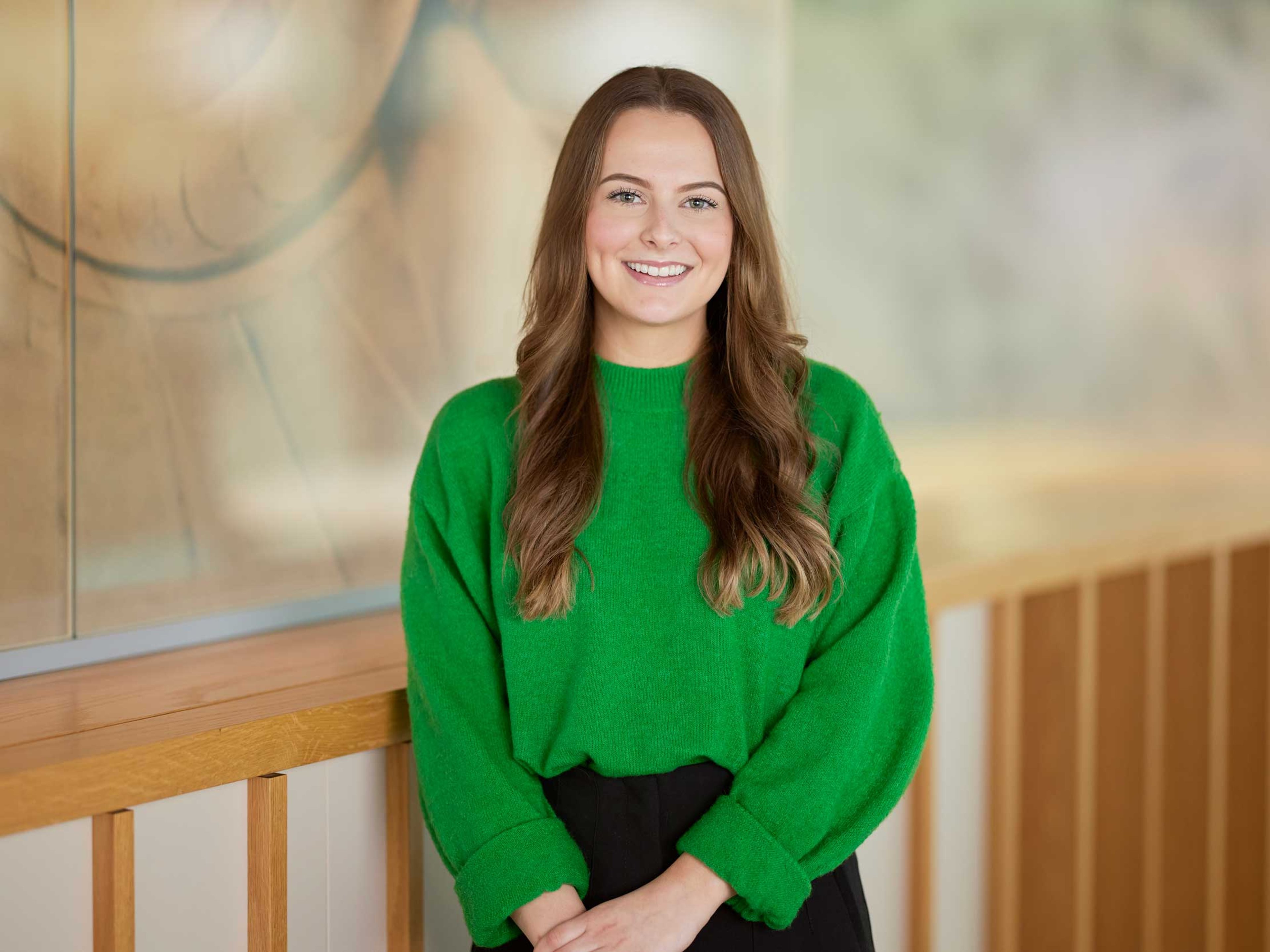 Amy Smith stood in the Baillie Gifford office.