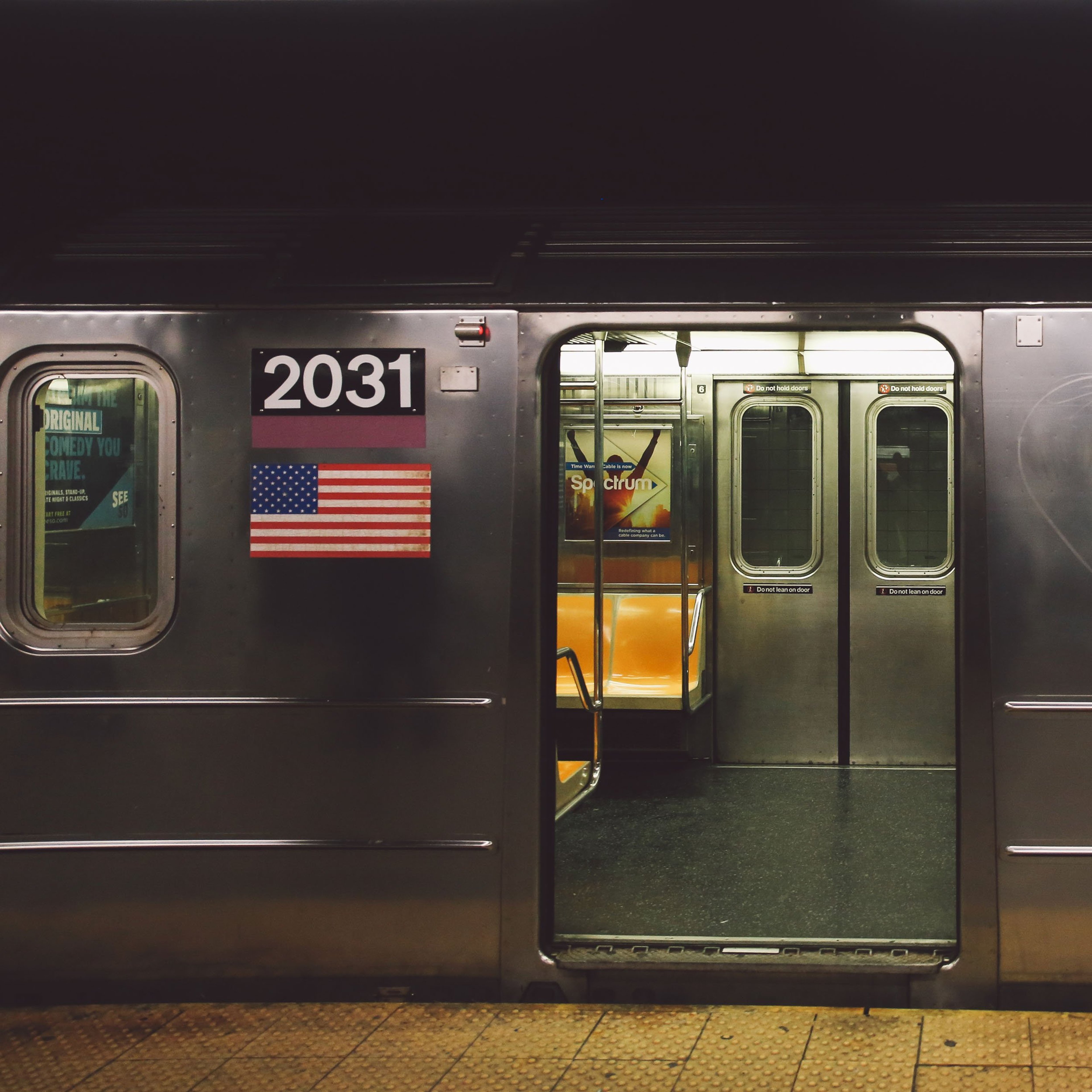 Open door of a New York subway train at the platform.