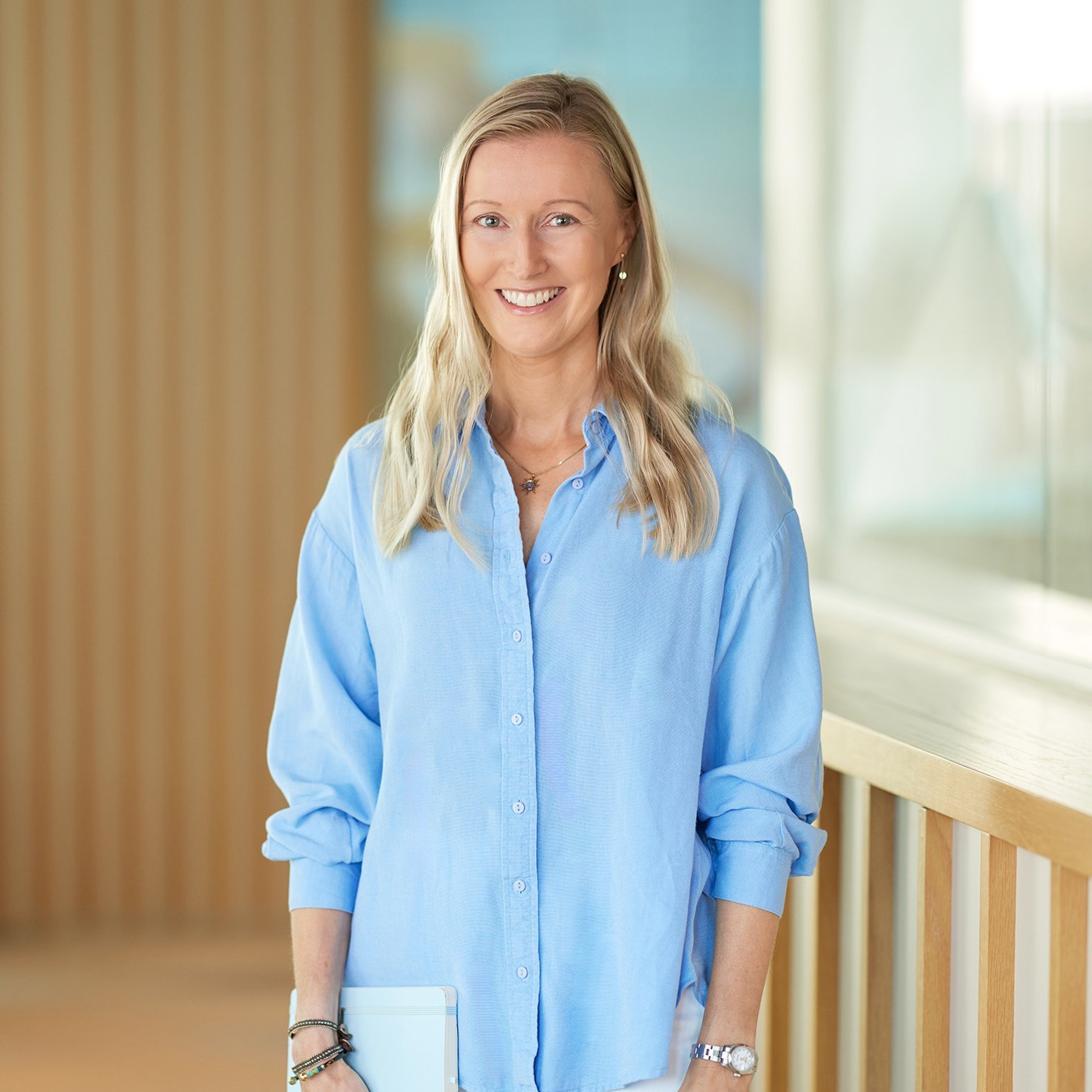 Anna Bretschneider standing in the Baillie Gifford office.