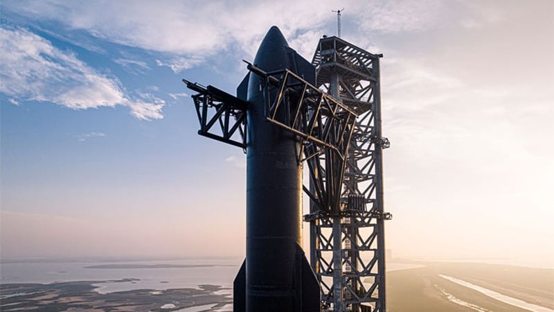 A Space X rocket sat on the launch pad on a mild day.
